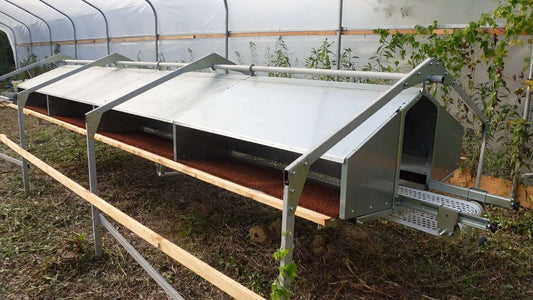 Side view of the Rollaway Nest Box System.