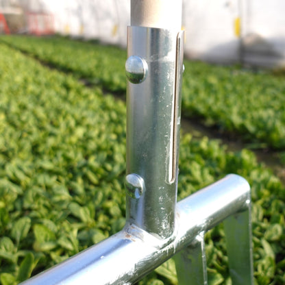 A close up of the Green Tools Tech Minifork with hardened steel tines loosening soil in a no-dig market garden 