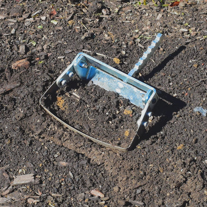 A close up of the Green Tools TECH Single Wheel Hoe 20 cm swing hoe blade for efficient no-dig market garden weeding and soil cultivation